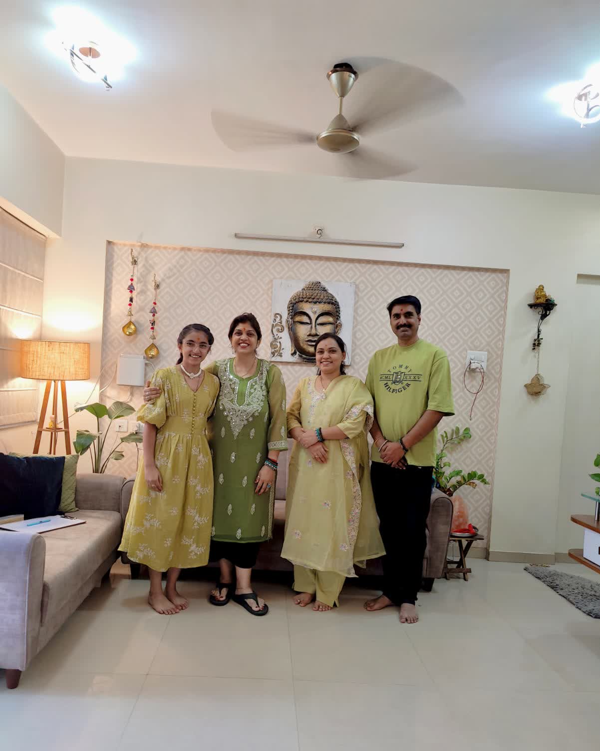 Rruchi Modayi with a client family after their session
